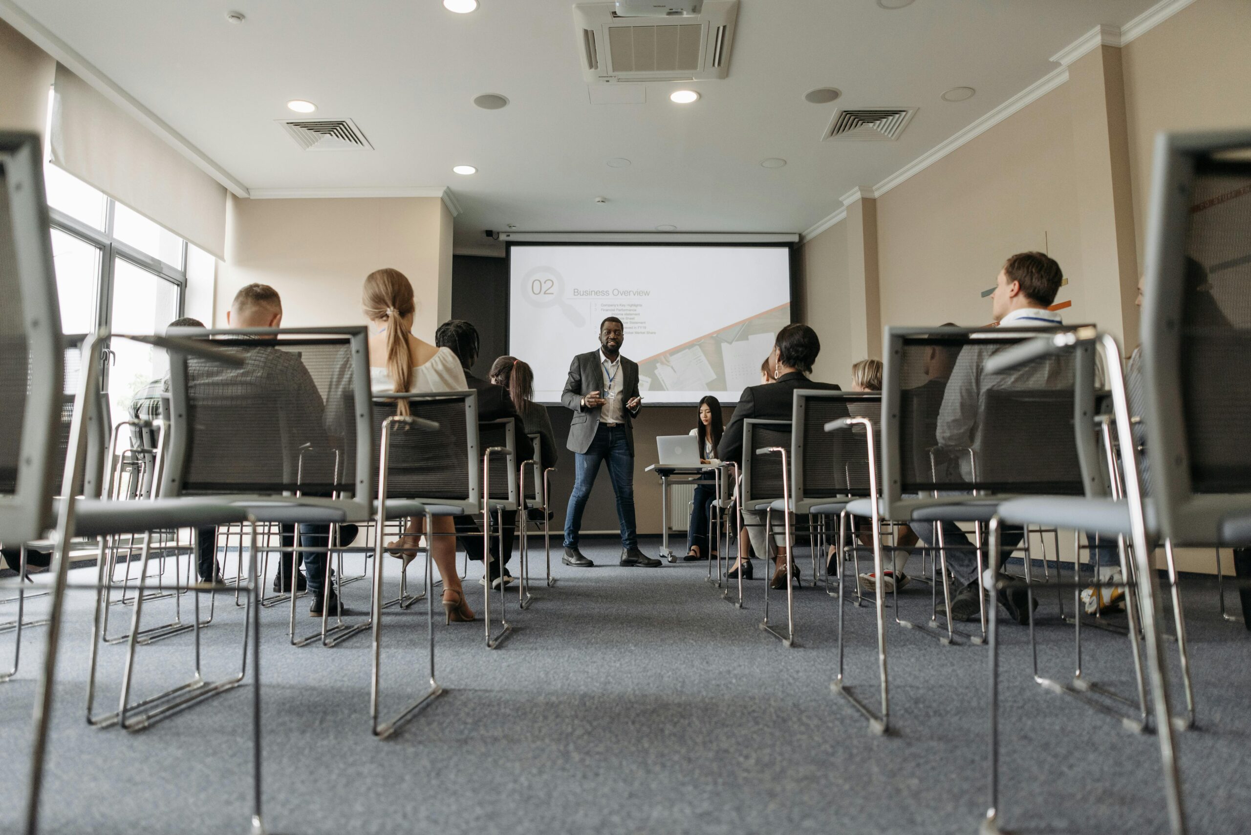 man conducting leadership and management training